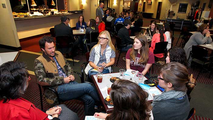 Blake Mycoskie talking with students in the Union Club