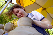 Student spinning pottery