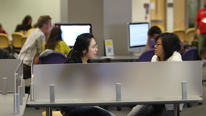 Students at work in the Bear CLAW, including a tutoring session