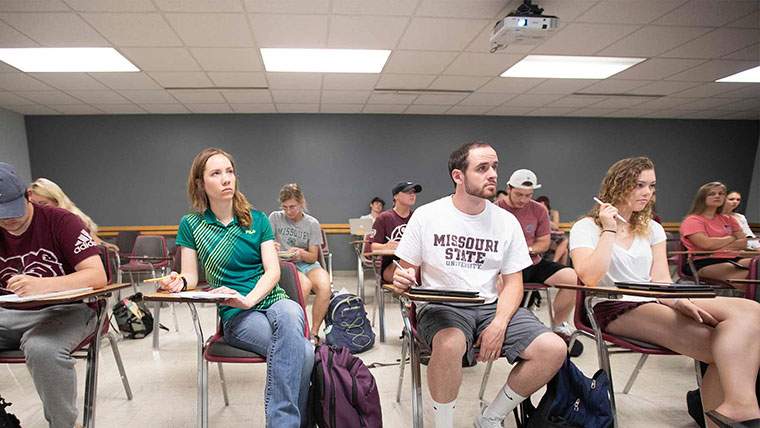 Kinesiology students seated in class.