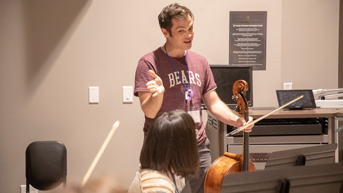 Dr. Ketter works with student musicians
