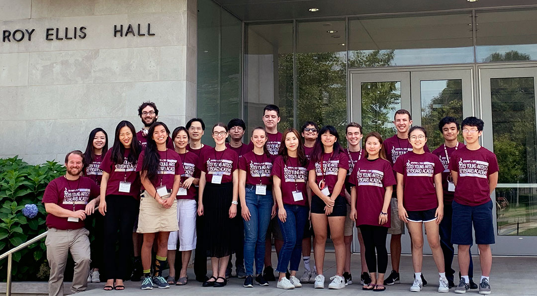 Students from Young Artists Keyboard Academy 2019 pose as group outside Roy Ellis Hall at MSU