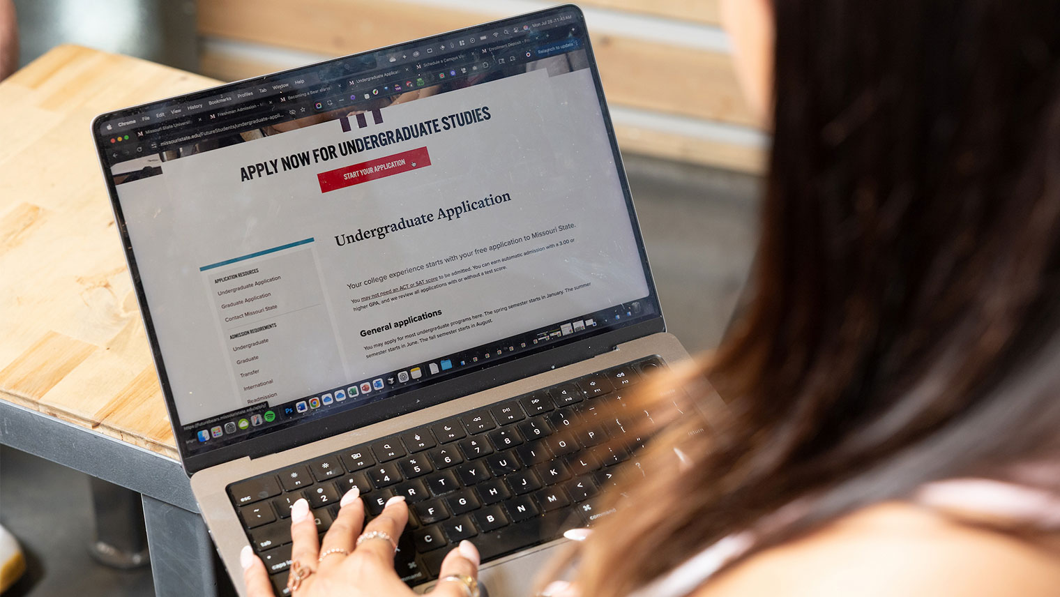 Missouri State student viewing online application on laptop