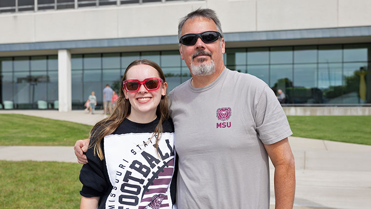 Female student with her dad