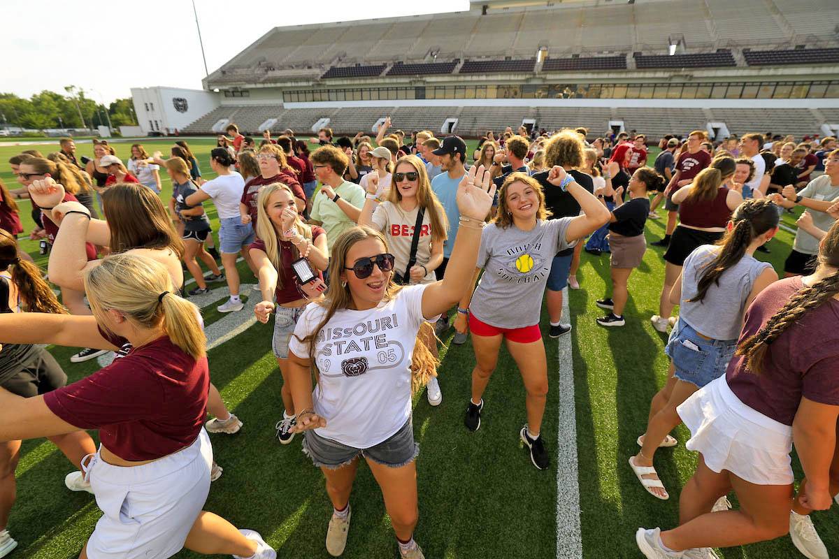 Missouri State students cheering on football field