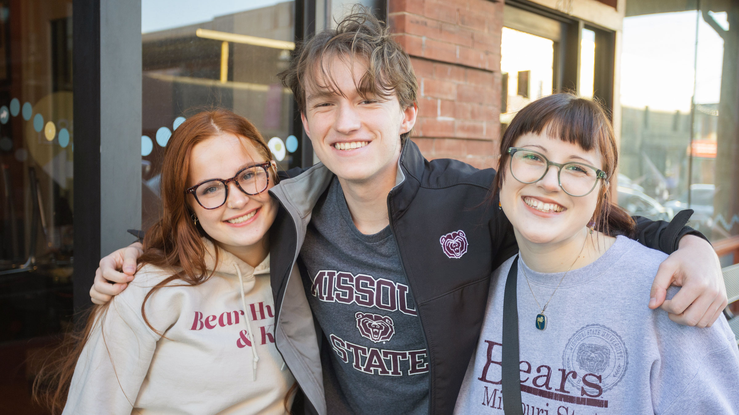 Three Missouri State Students looking at the camera for a group shot.