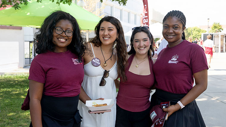 Four Mo State students posing for a group photo