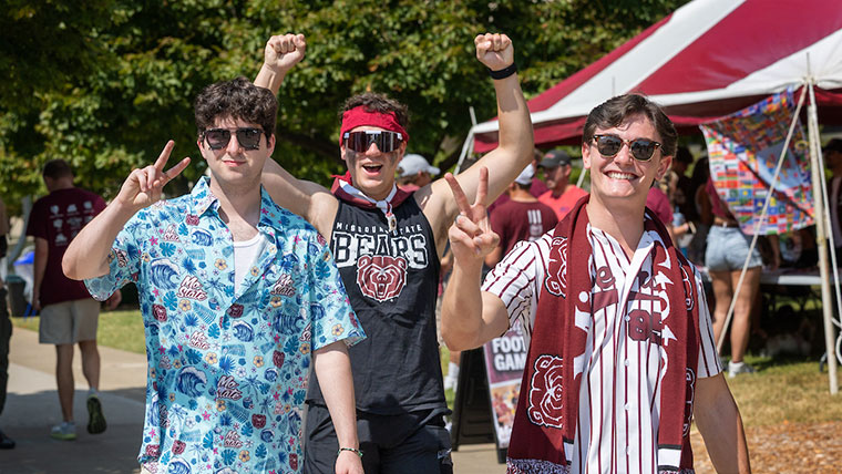 Three Mo State male students dressed in BearWear