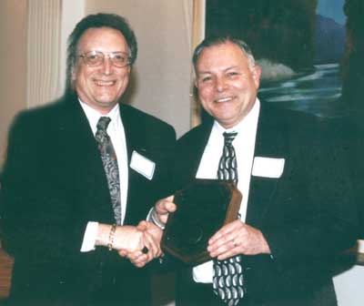 Dean Curtis P. Lawrence with faculty recipient Jim Moyer
