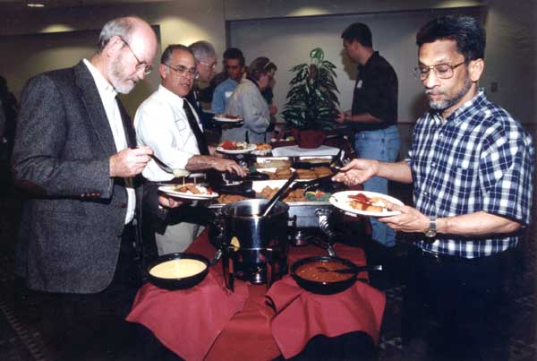 Fred Maxwell, Mike Carlie and Robin Amonker enjoy a trip to the buffet.