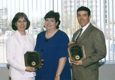 Kathy Davis standing between Staff Reciepent Stephanie Merinec and Faculty Reciepent  Randy Dillon