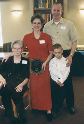 Staff recipient Cind Fiedler with her family