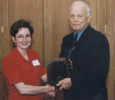 Staff recipient Cind Fiedler with President Keiser