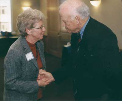 President Keiser congratulates faculty recipient J.B. Petty