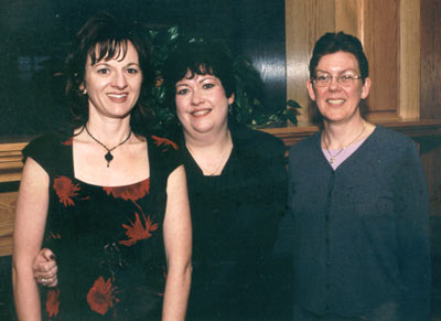 Recipients Angela Spence and Tamera Jahnke with Kathy Davis