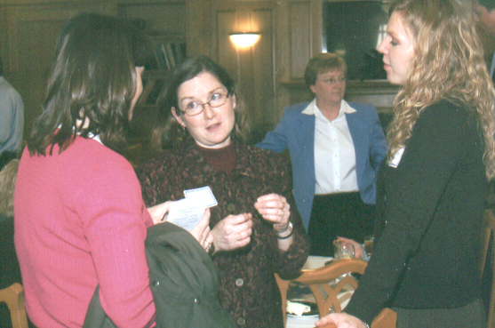 Cindy Fiedler and Amy Marie Aufdembring chatting with some friends