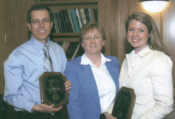 David Lutz and Kimberly Stagner with Dr. Pemberton