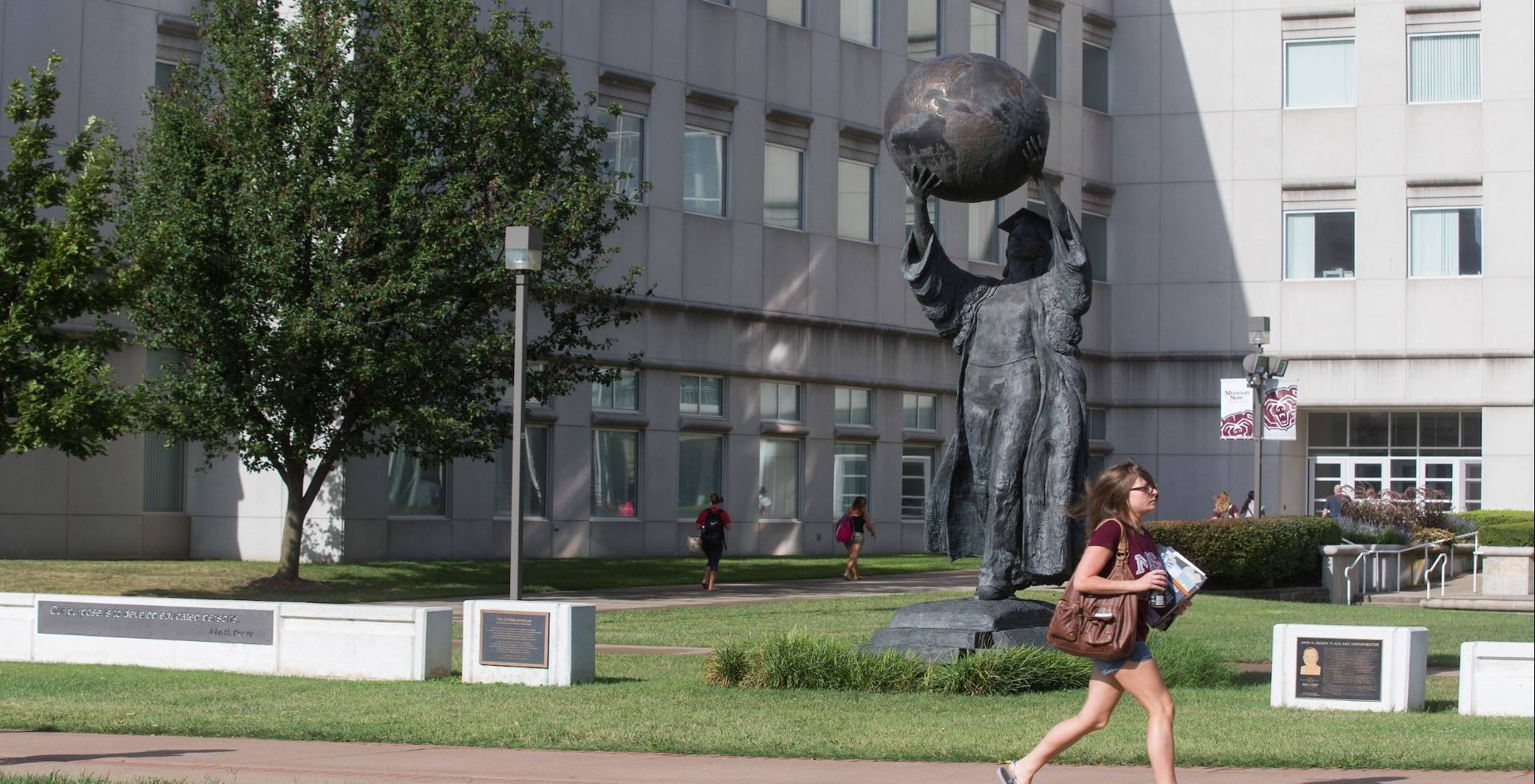 Citizen Scholar Statue in Front of Strong Hall