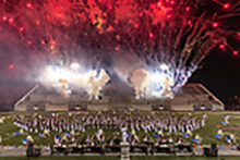 Band performing with fireworks