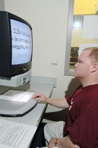 A student uses assistive technology