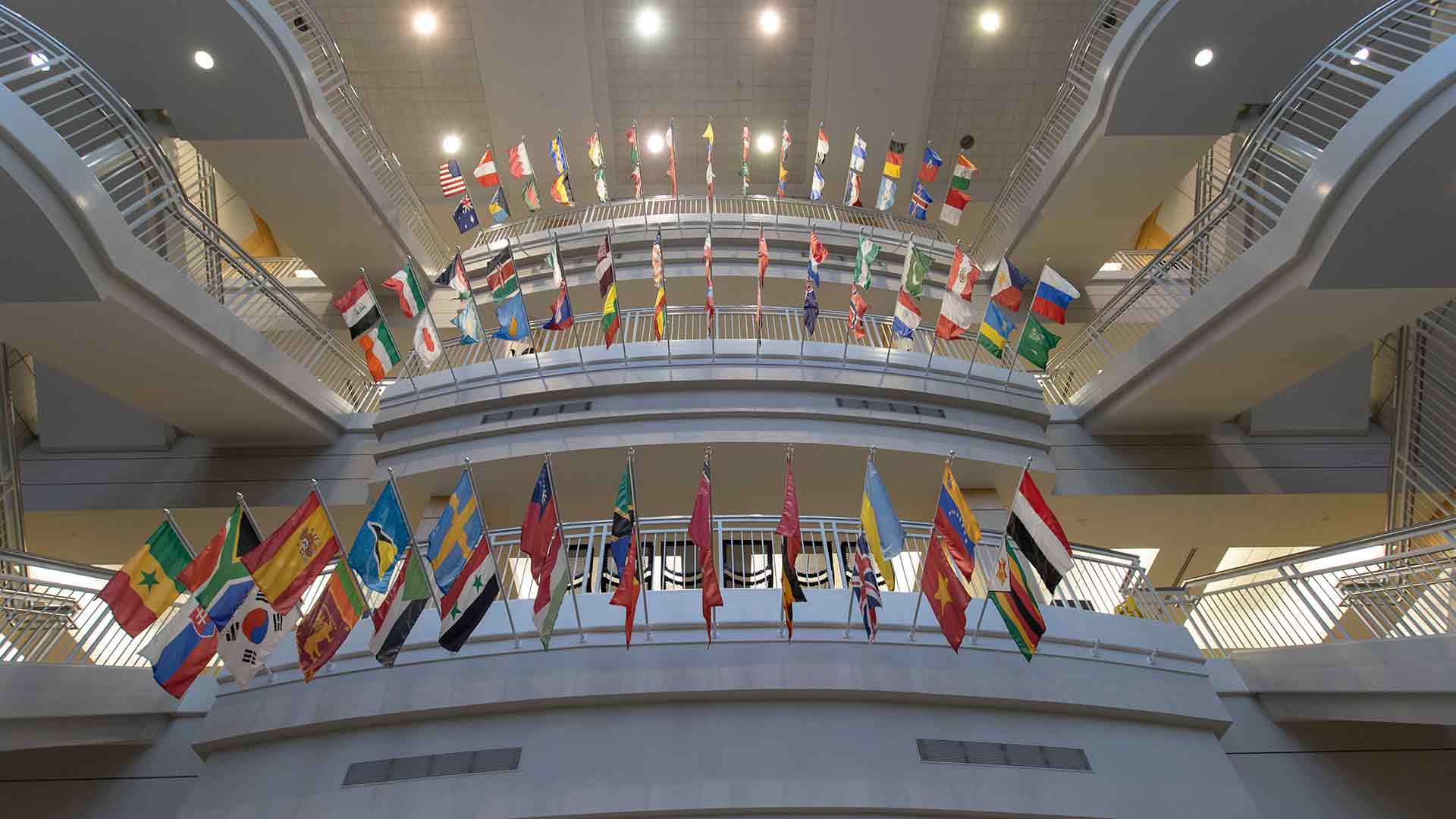 International flags displayed in Strong Hall.