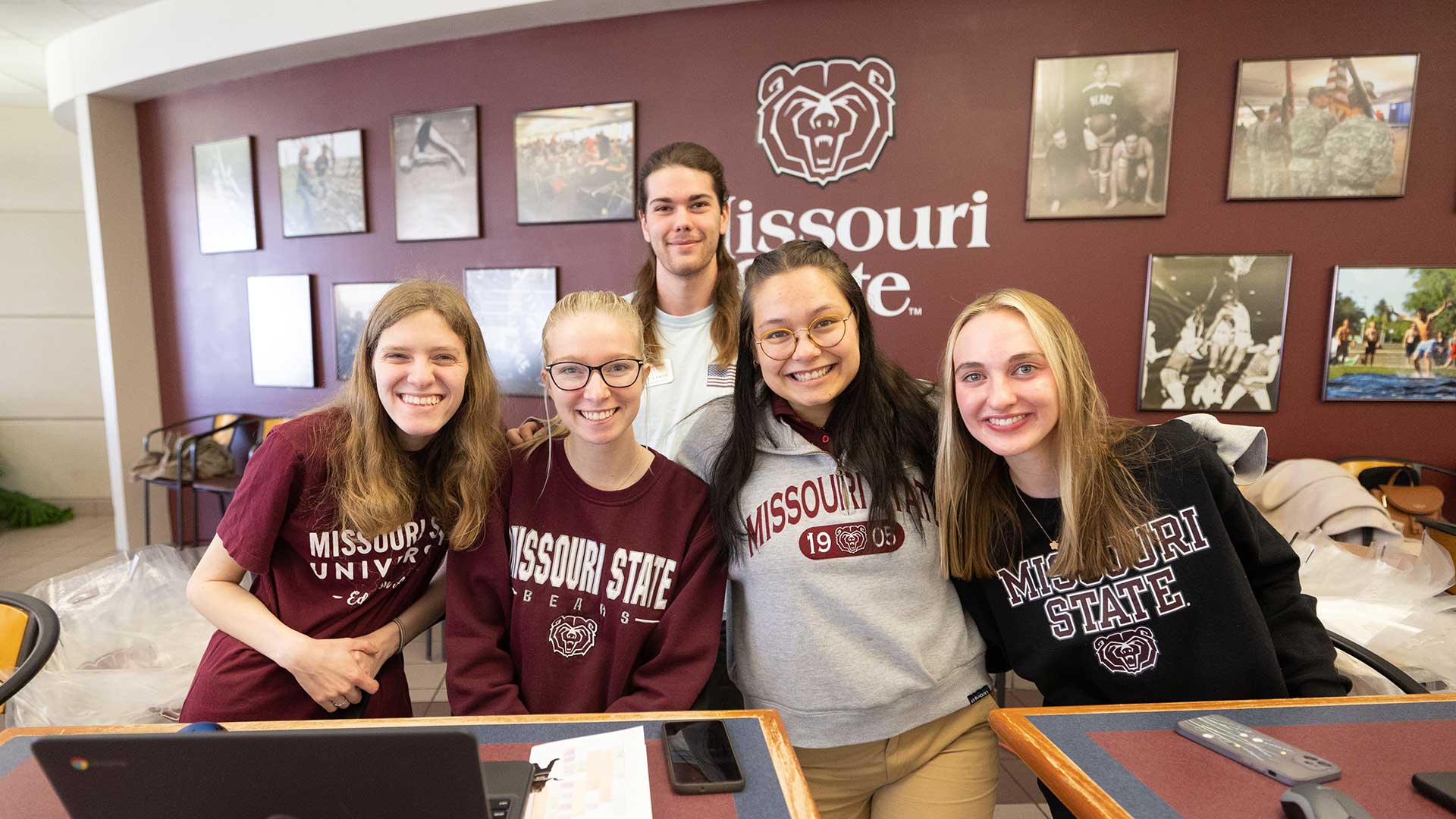 Smiling Missouri State students in the student union.