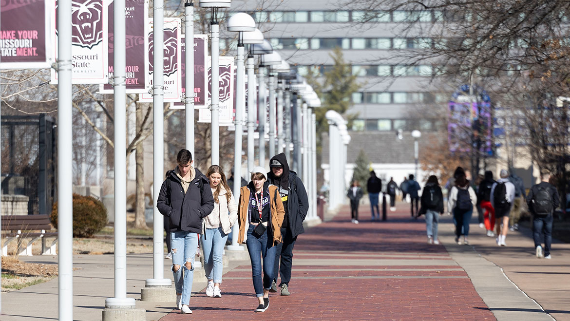 students walking on campus 