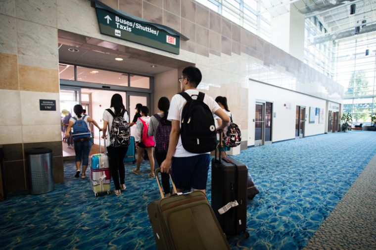 Student heading toward the exit in airport