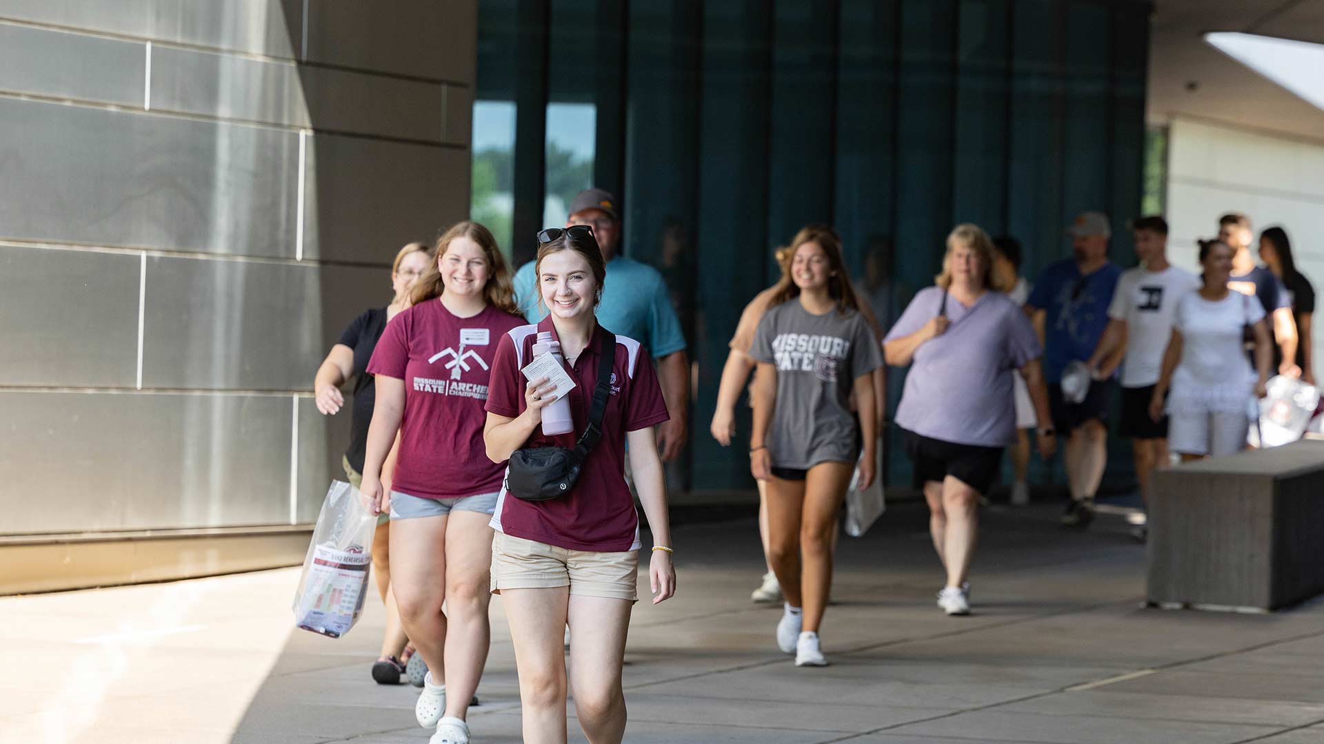 A Missouri State employee takes prospective students and their families on a tour of the Foster Recreation Center.