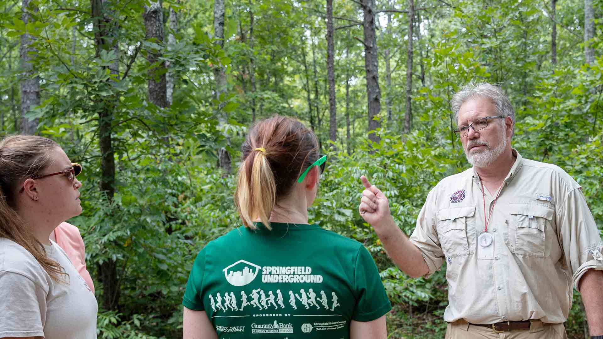 A MSU professor guides students on a sustainability tour.