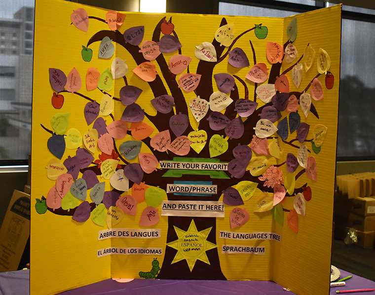 Student's poster featuring a tree of language for World Language Day