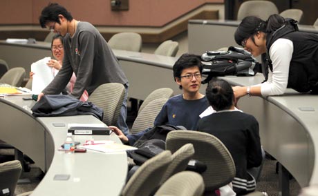 Students studying in lecture hall