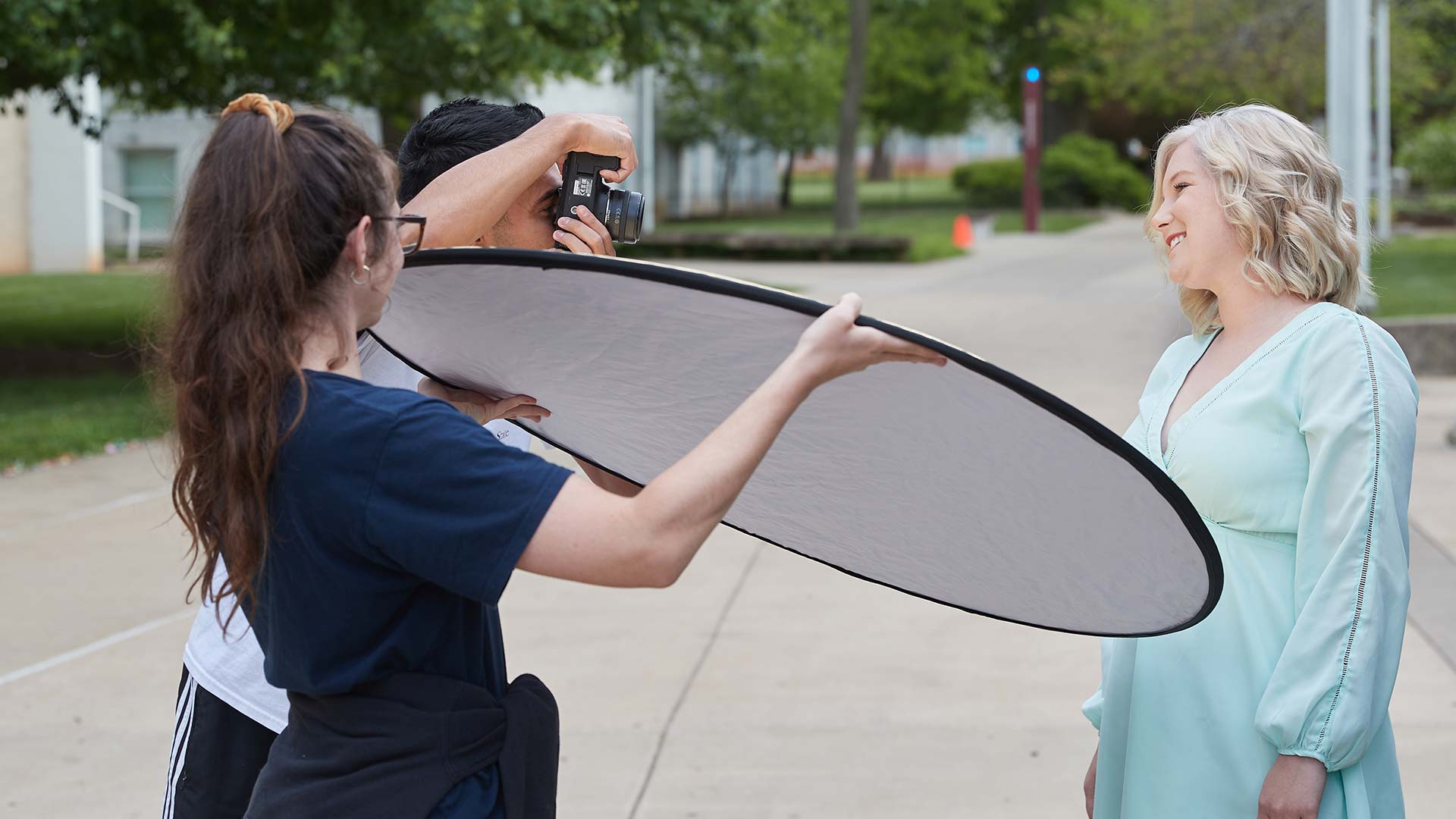 Photo shoot with a #BearGrad on campus.