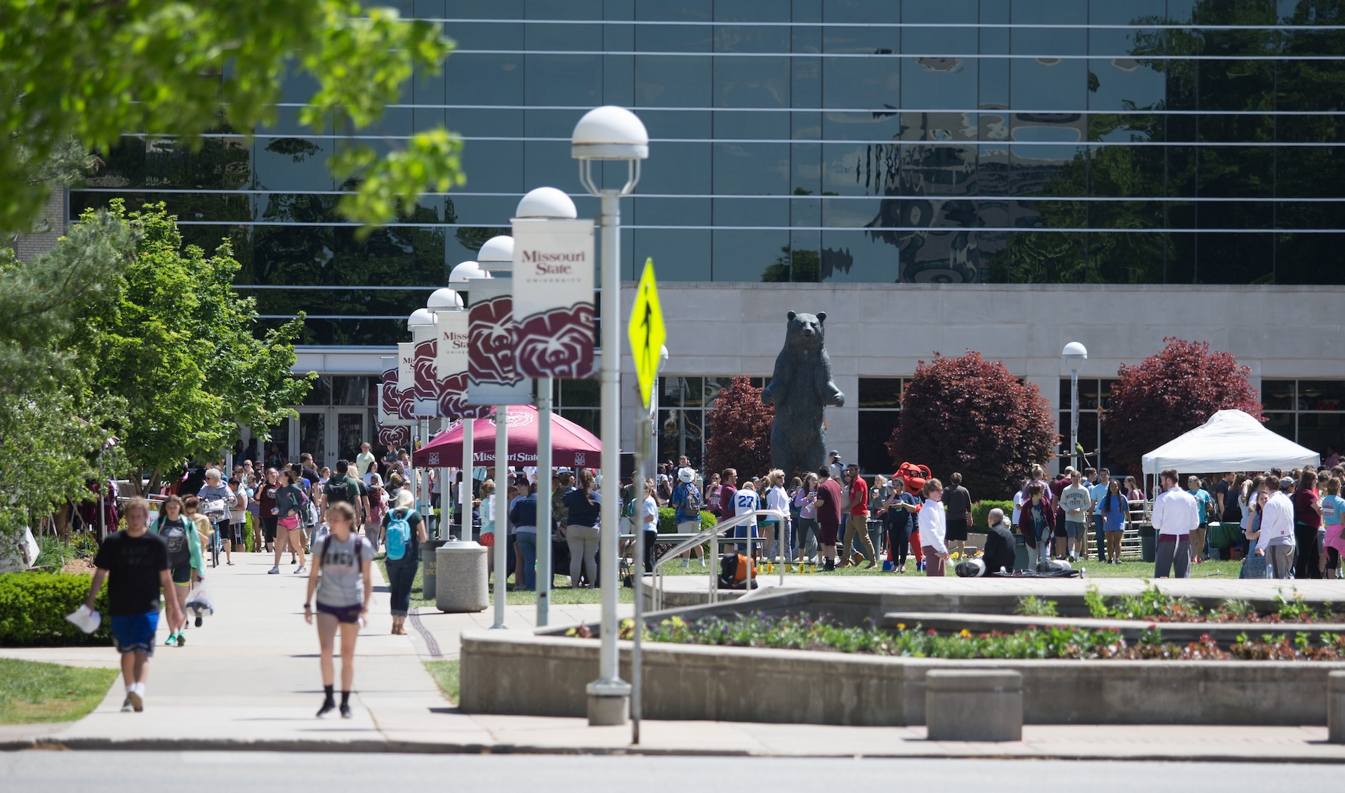 Students on campus on a sunny day