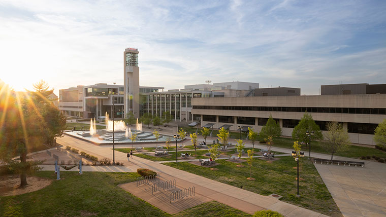 A view of the Missouri State campus, featuring the fountain, Meyer Library and Glass Hall.