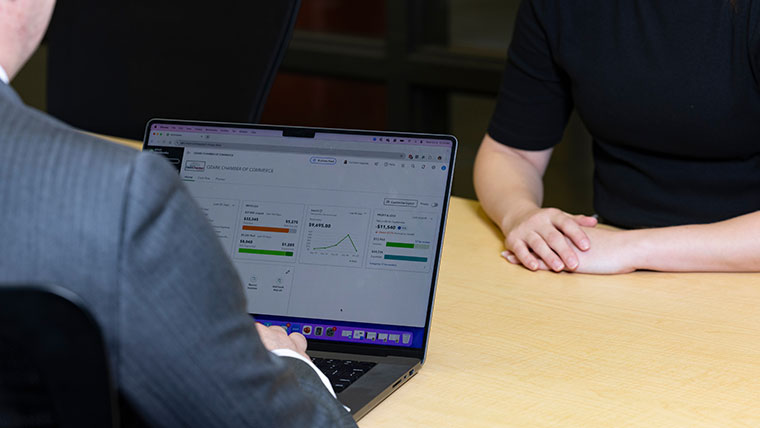 Stats displayed on a professional's laptop screen