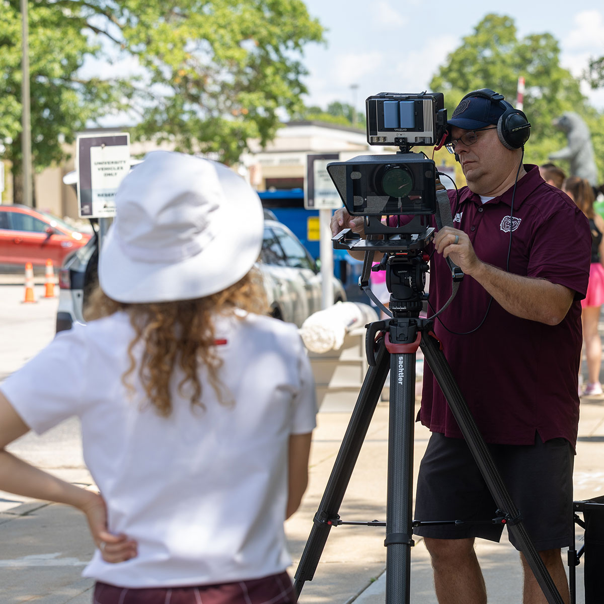 Chris Nagle and Megan Swift, video production staff, test out the video equipment.