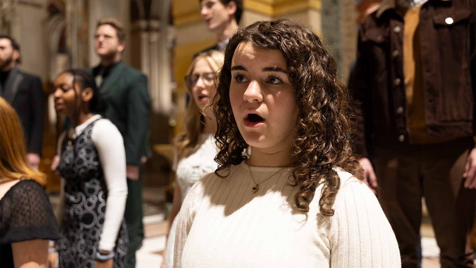 The Missouri State University Chorale performing in a church.