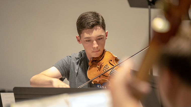Student plays violin