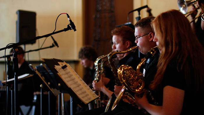MSU jazz student musicians playing their saxophones