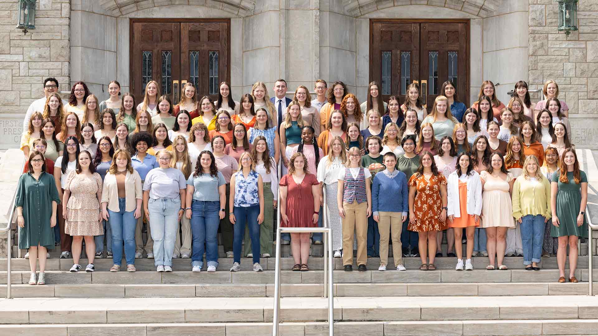 Women's Chorus posing for a group photo.