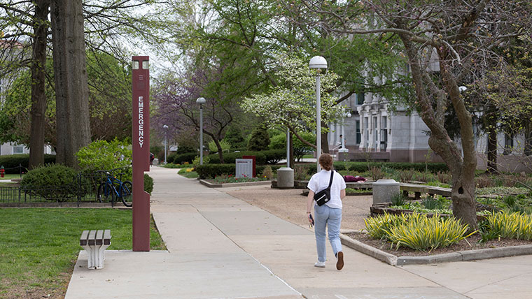 Missouri State student walking on campus.