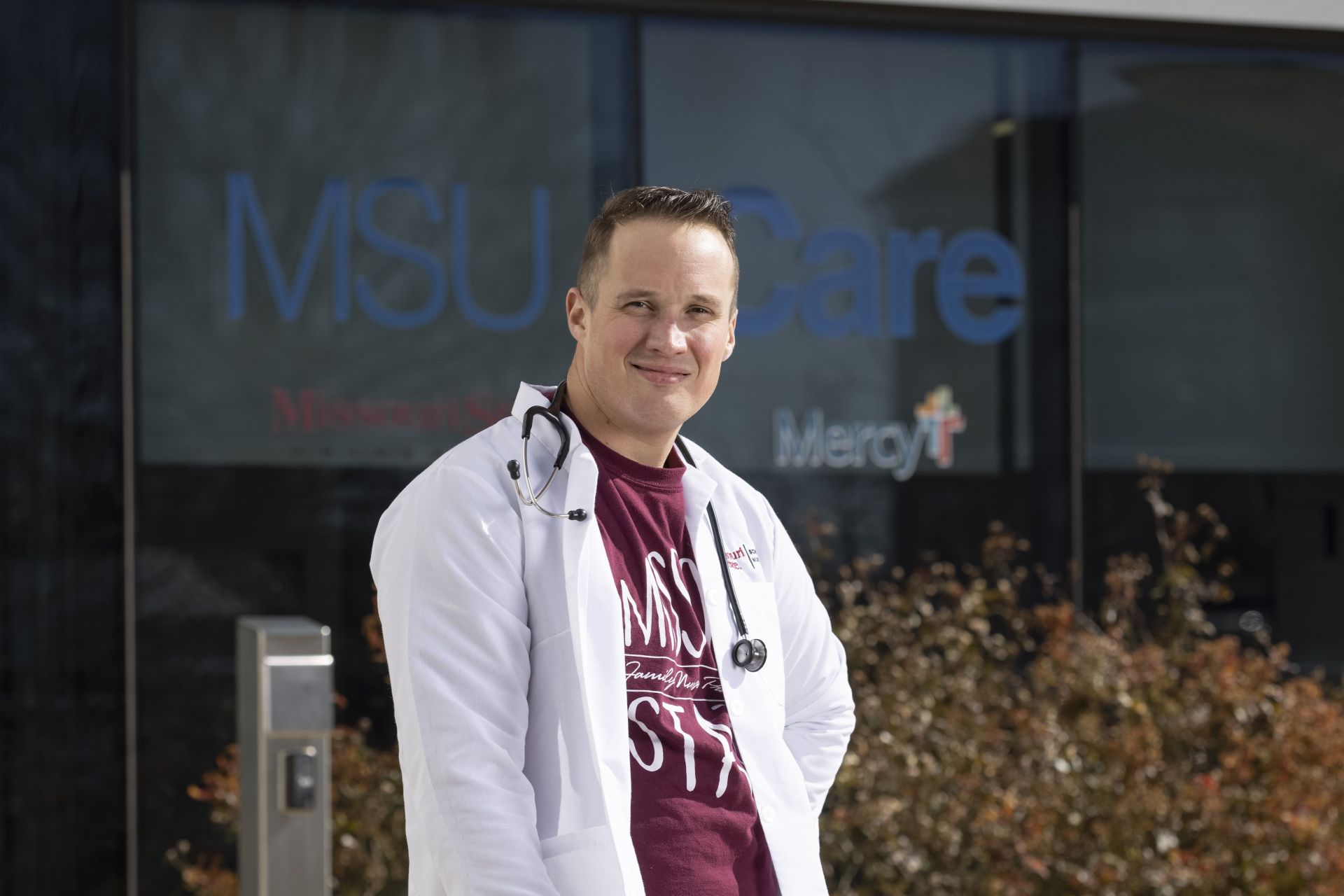 Graduate nursing student stands outside of the MSU Care Clinic