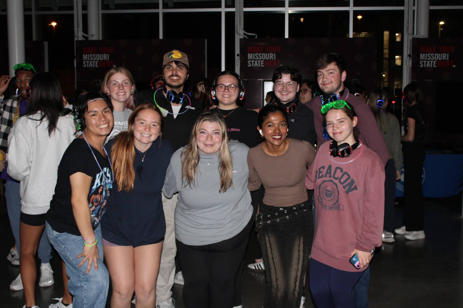 Students at headphone disco. 