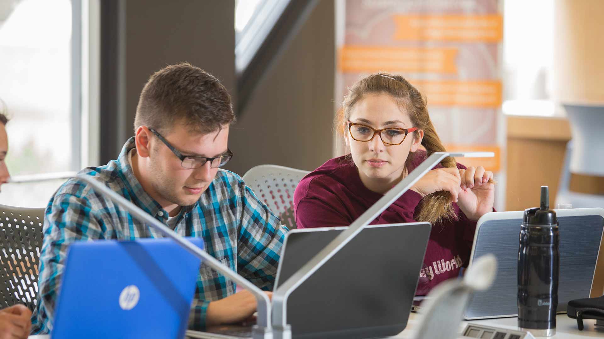 Accounting students using laptops.