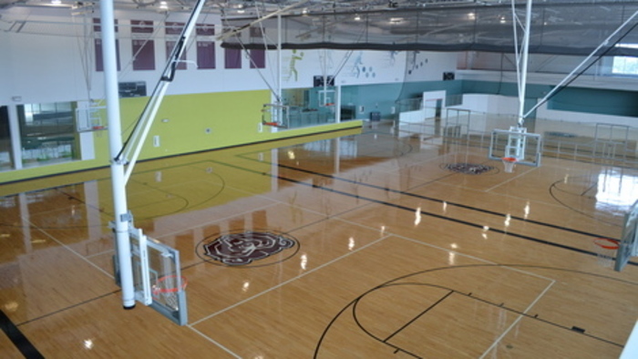 Bird's-eye view of basketball courts inside the Foster Recreation Center