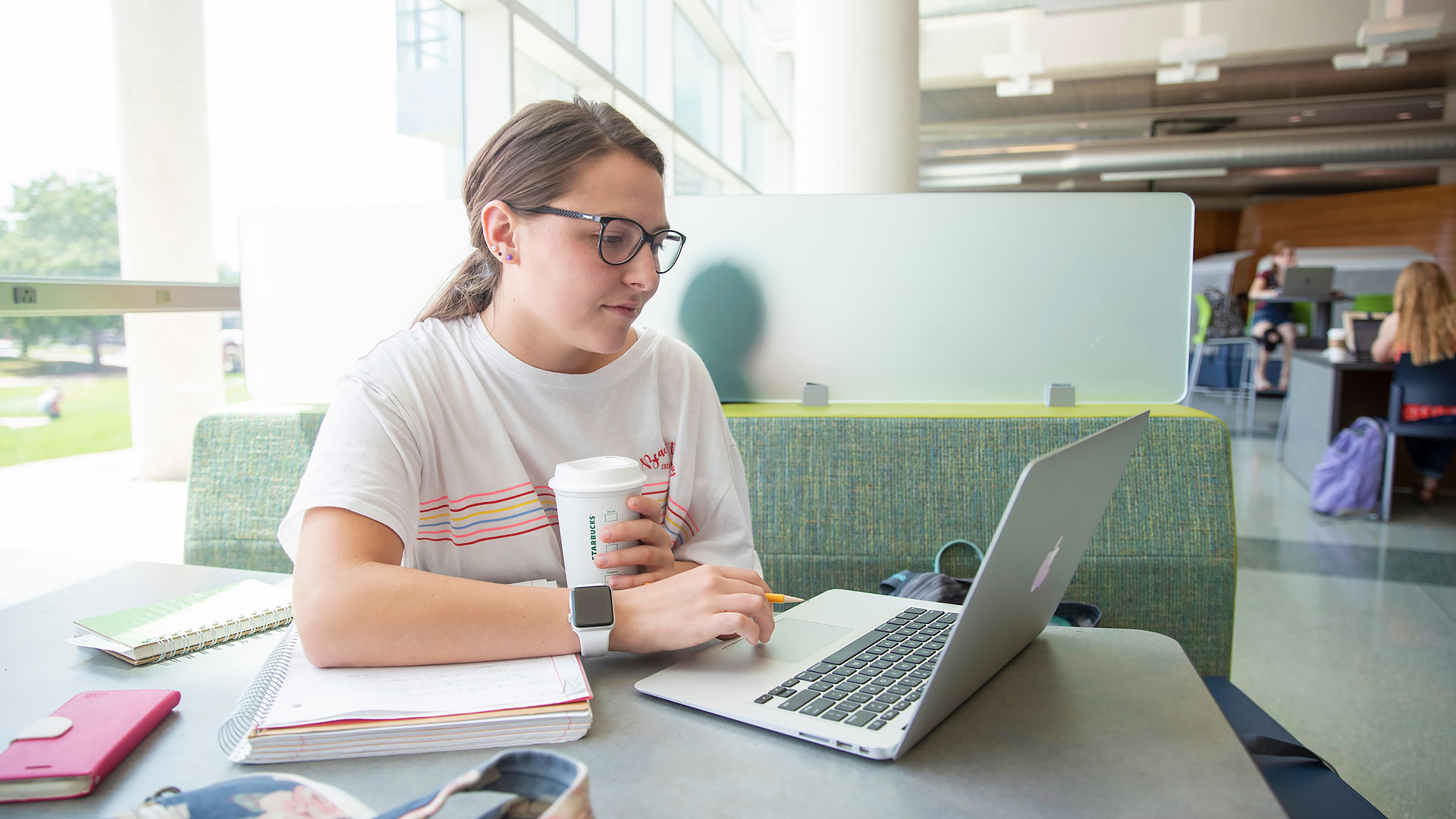 Female Missouri State student viewing laptop