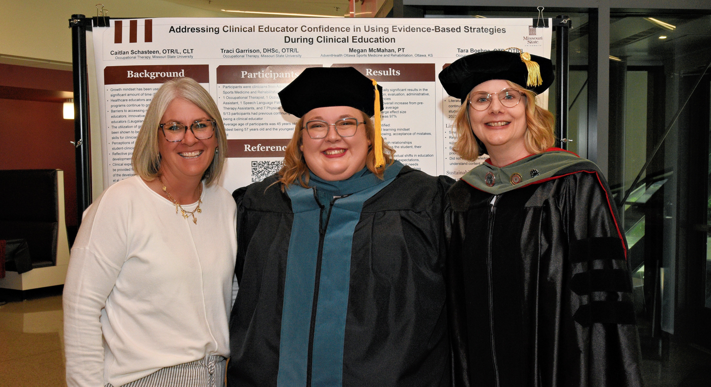 A graduating PP-OTD student with her faculty advisor and content expert. 