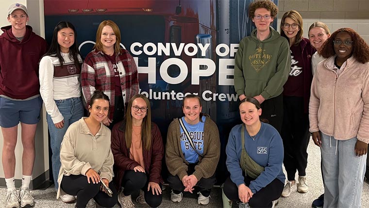 A group of nutrition and dietetics students with their professor, Sarah Murray, at a Convoy of Hope volunteer event.