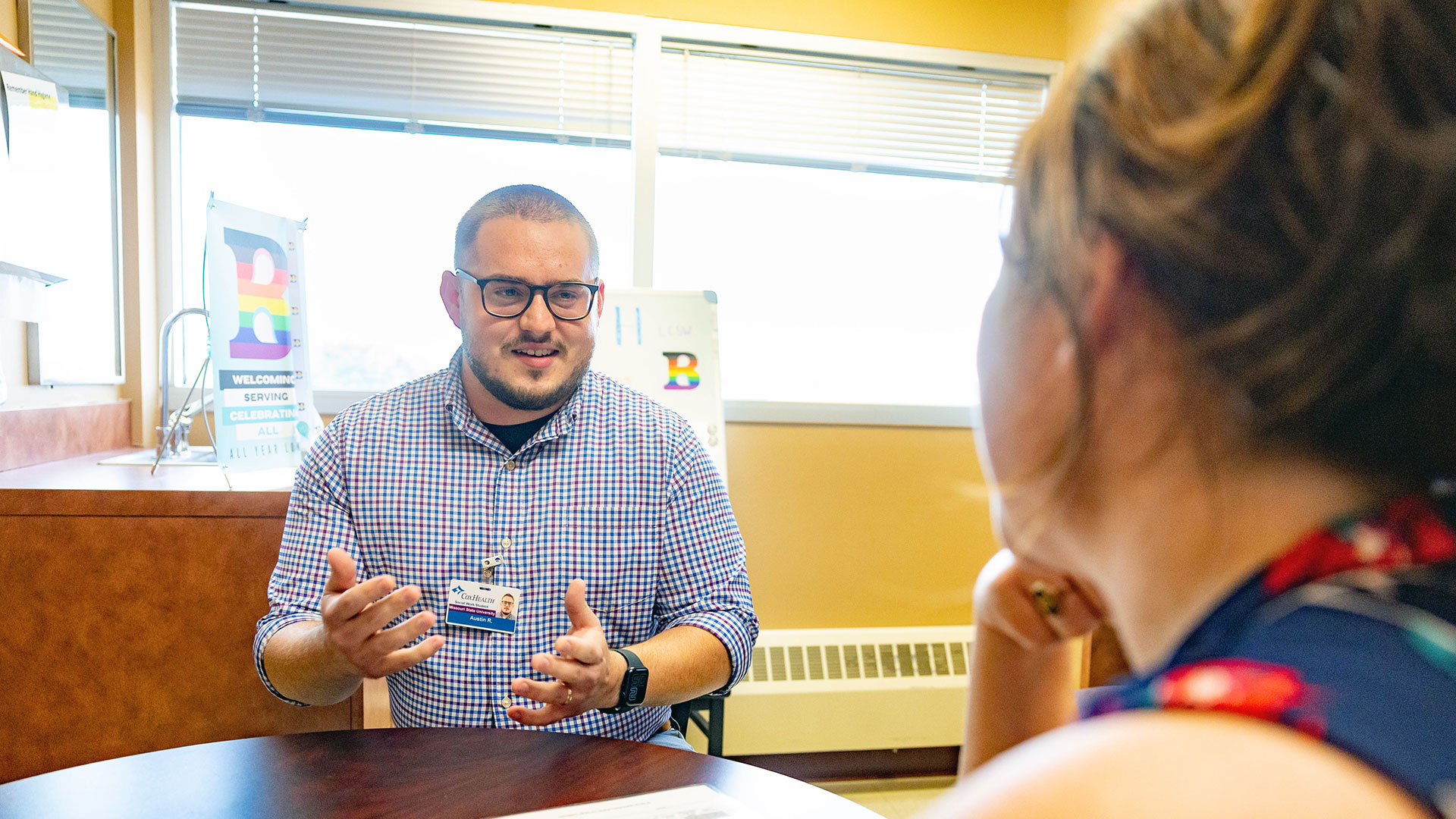 A student in the Missouri State social work program interacts with a community social work professional